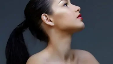 Lady with clear skin looking up